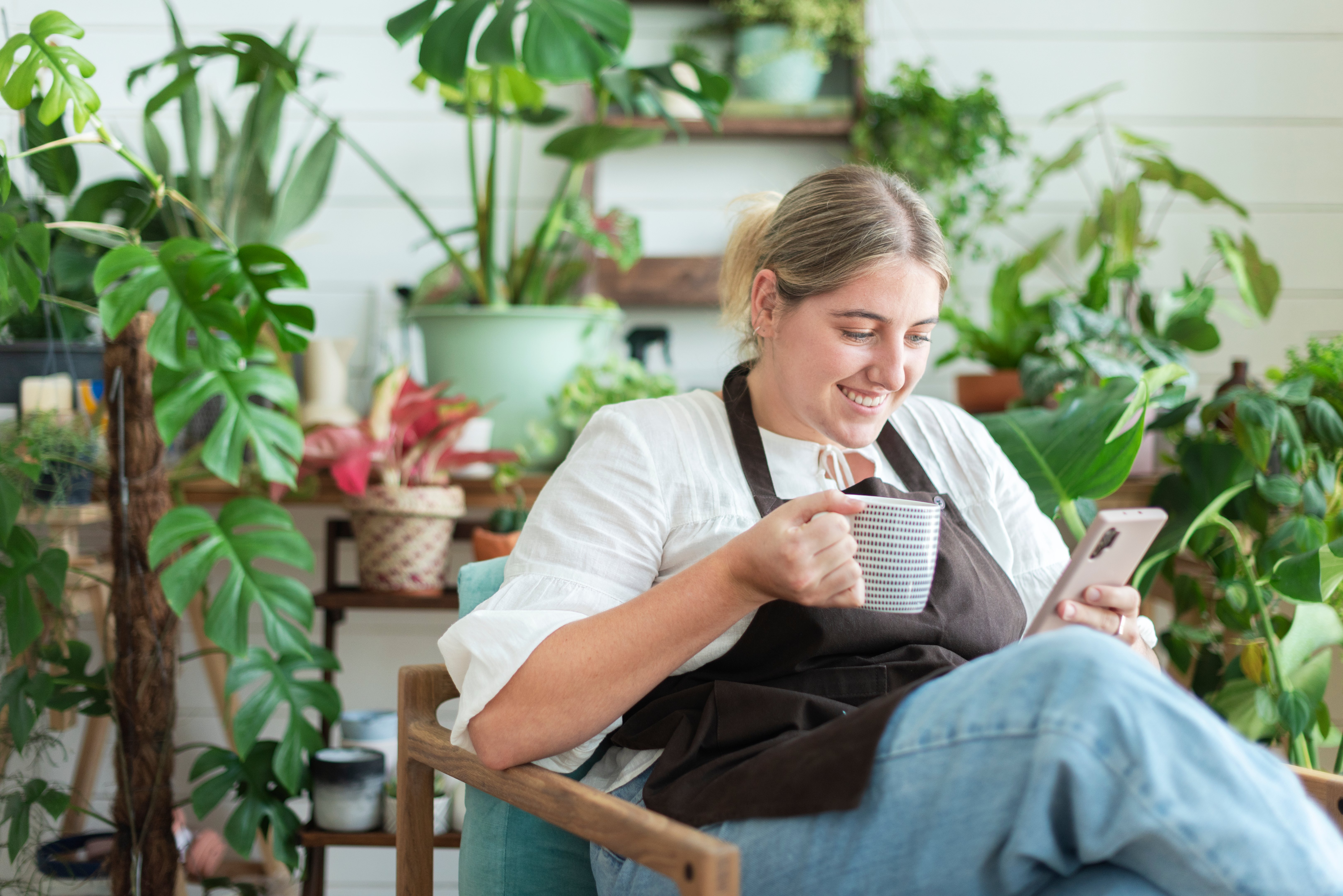 small business owner using smartphone